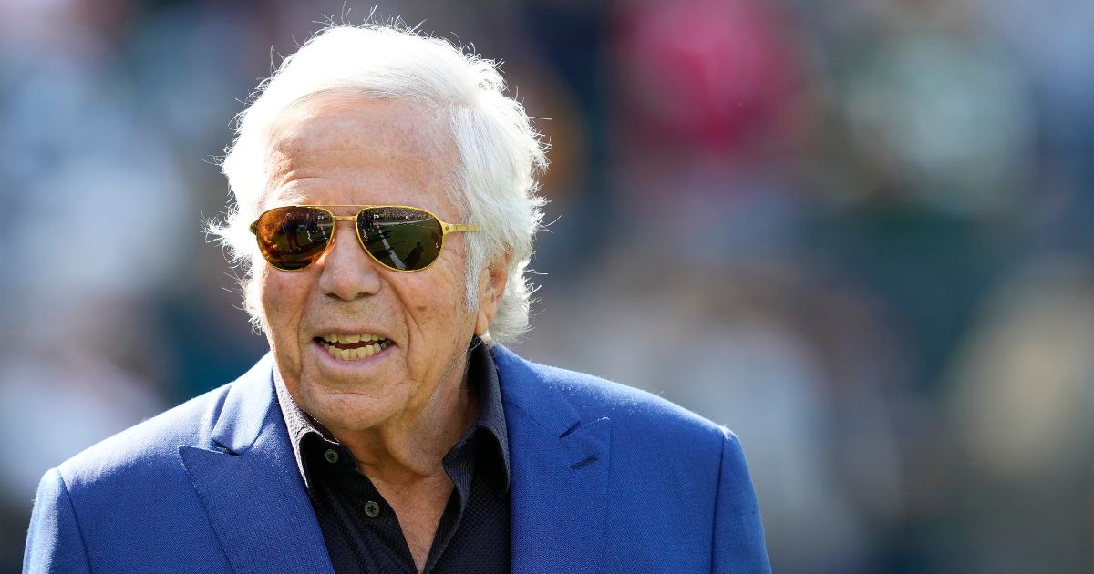 New England Patriots owner Robert Kraft stands on the field during pregame warmups before a game against the Green Bay Packers at Lambeau Field on Oct. 2 in Green Bay, Wisconsin.