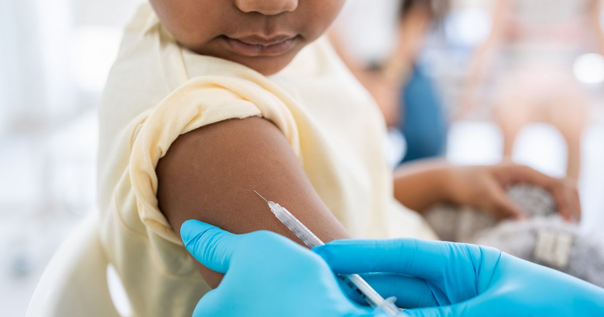 a child receiving a vaccine.