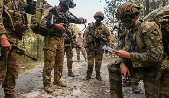 Soldiers of the 101st U.S. Airborne Division take part in a drill on Saturday in Solina, Poland.