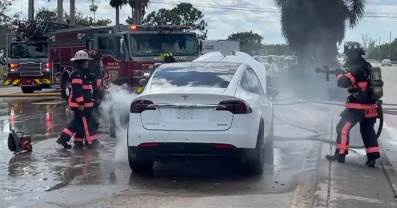 The above image is of a Tesla being extinguished after Hurricane Ian.
