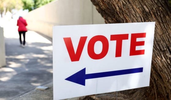 A voting sign is posted on Thursday in Santa Ana, California.