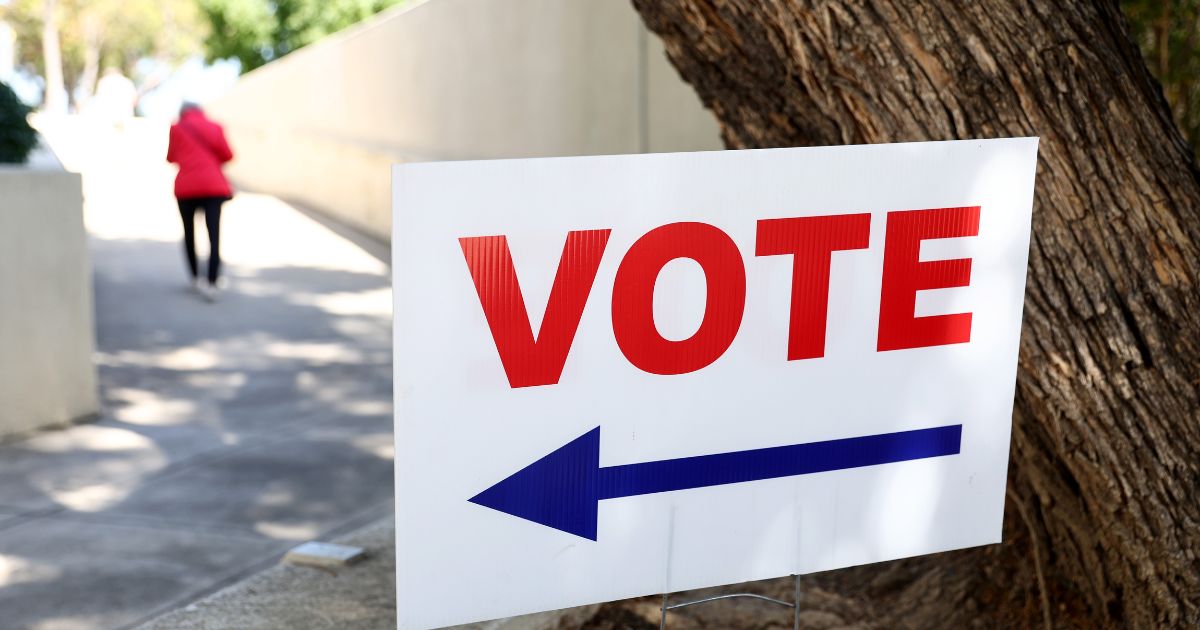 A voting sign is posted on Thursday in Santa Ana, California.
