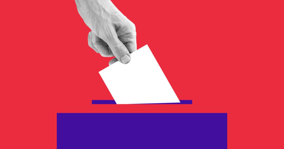 The above stock image is of hand voting.