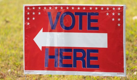 A sign is seen as early voting begins on Monday in Atlanta.