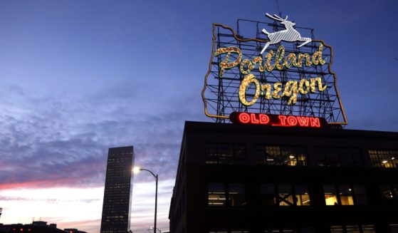 The "Portland Oregon" sign is seen atop a building in downtown Portland, Oregon, on Jan. 27, 2015.