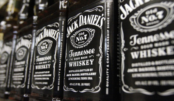 Bottles of Jack Daniel's Tennessee Whiskey sit on the shelf of a liquor store in Montpelier, Vermont, on Dec. 5, 2011.