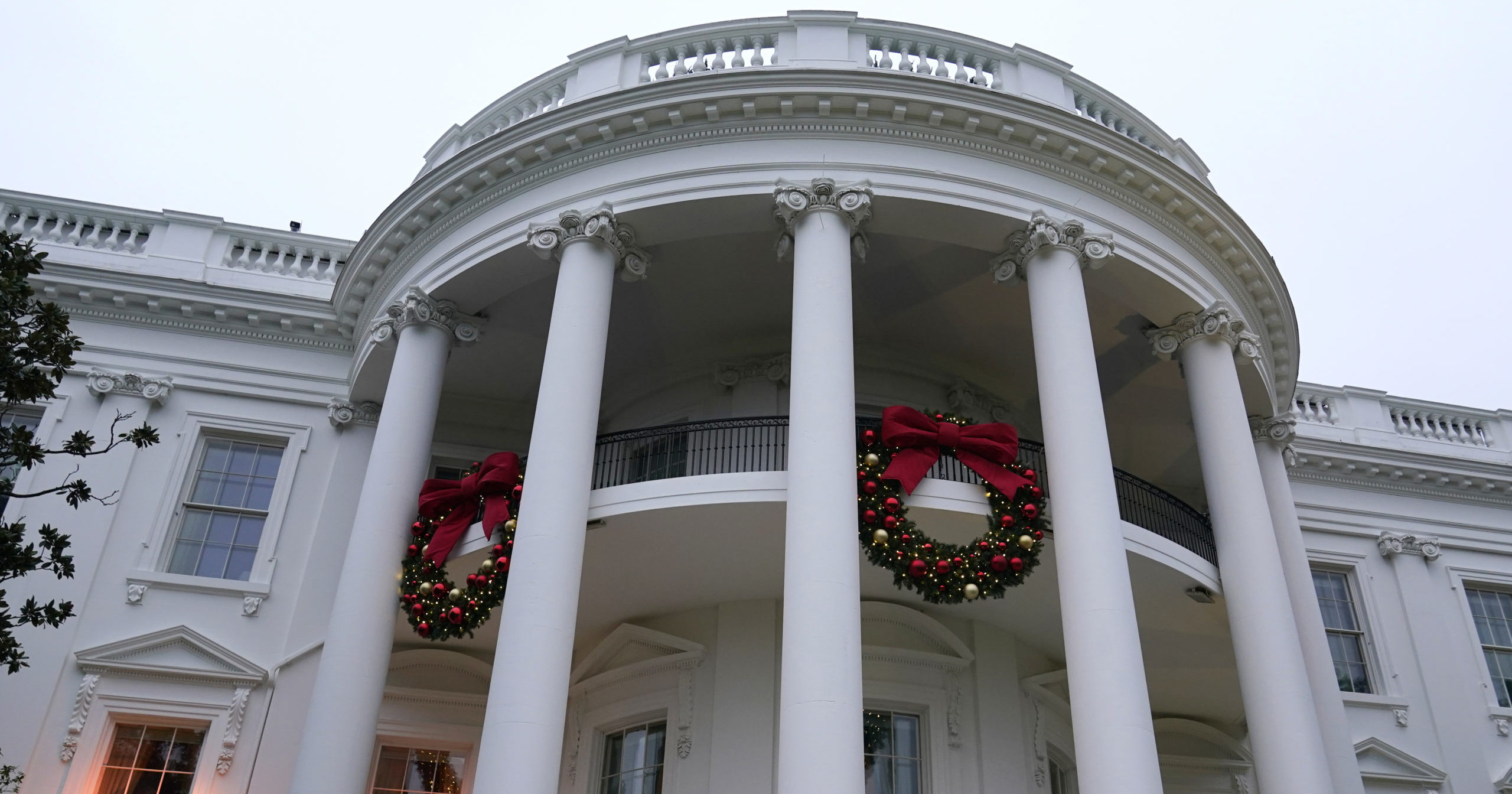 Wreaths hang on the Truman Balcony of the White House in Washington, D.C., on Sunday.