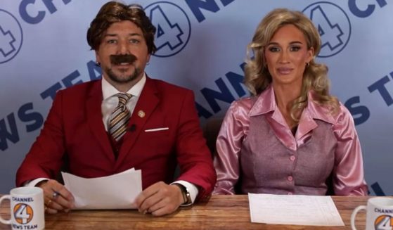 Country music star Jason Aldean and his wife, Brittany, dressed up as Ron Burgundy and Veronica Corningstone for a video skit mocking wokeness.