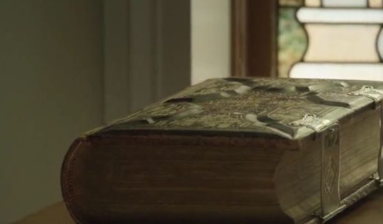 A 100-year-old Bible held a clue that led investigators to the suspects.