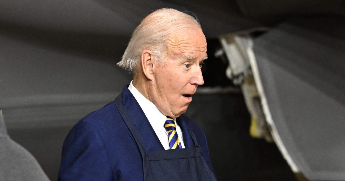 President Joe Biden serves food to military families during a "Friendsgiving" celebration in Cherry Point, North Carolina, on Tuesday.