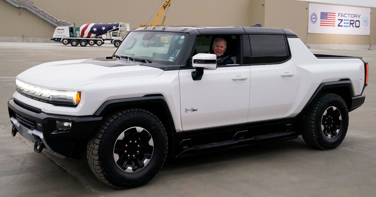 President Joe Biden test drives a Hummer at the General Motors Factory Zero electric vehicle assembly plant in Detroit during a tour Nov. 17, 2021.