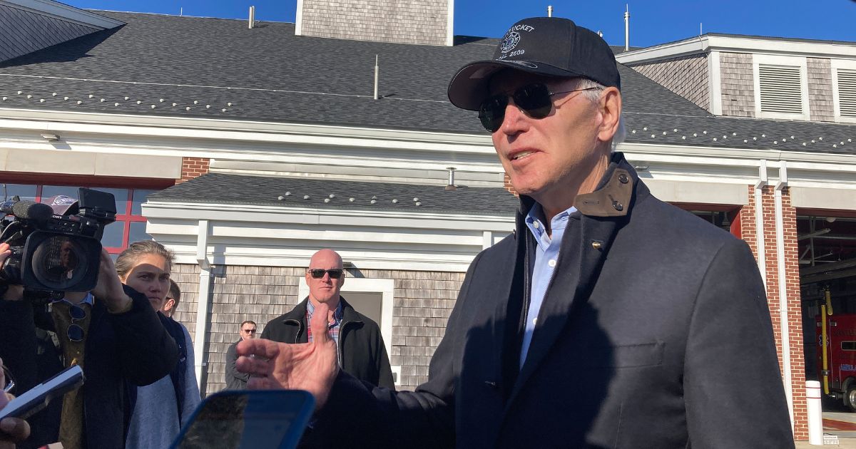 President Joe Biden talks with reporters during a Thanksgiving visit to the Nantucket Fire Department in Nantucket, Massachusetts on Thursday morning.