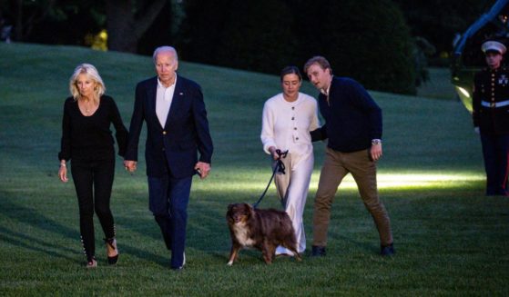 First lady Jill Biden, left, and President Joe Biden, middle left, walk with Naomi Biden, middle right, and her fiance Peter Neal, right, to the White House from Marine One on June 20.