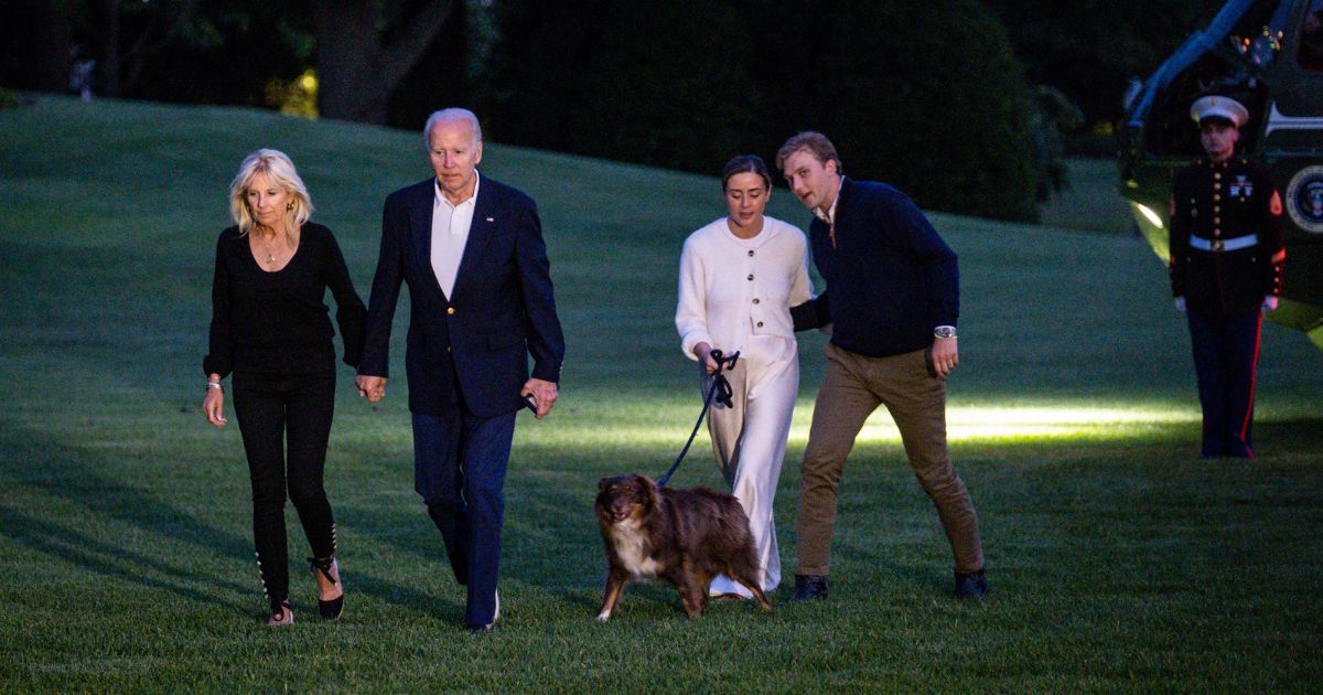 First lady Jill Biden, left, and President Joe Biden, middle left, walk with Naomi Biden, middle right, and her fiance Peter Neal, right, to the White House from Marine One on June 20.