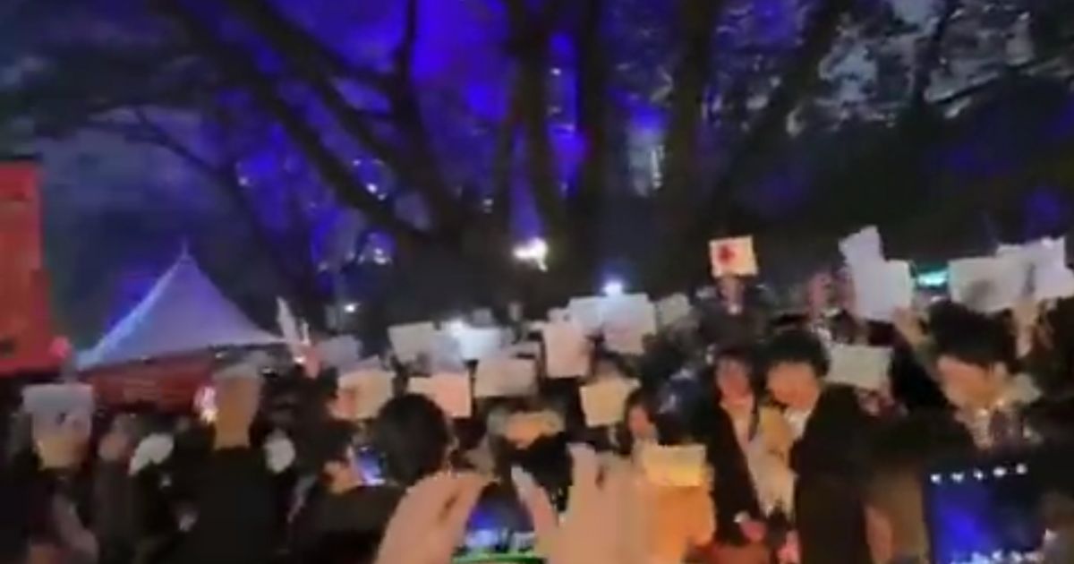 Chinese protesters use blank sheets of white paper to protest the government's COVID lockdowns.
