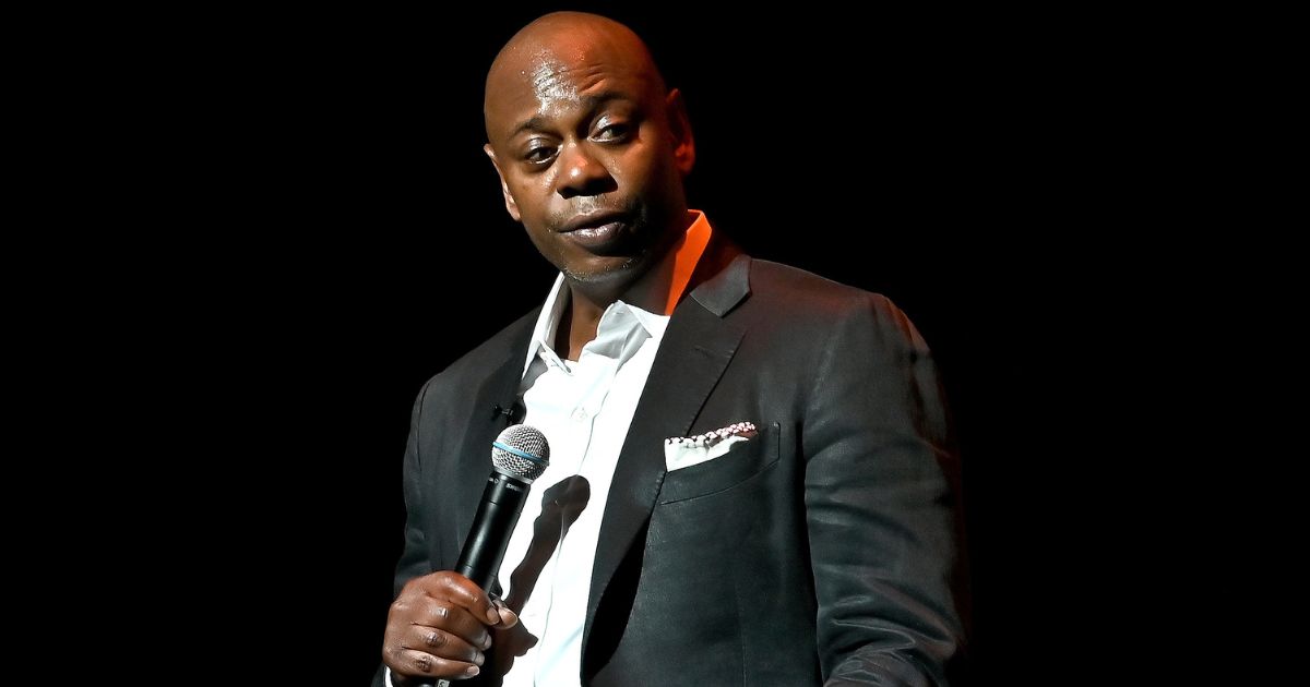 Comedian Dave Chappelle speaks during the Dave Chappelle theater dedication ceremony at Duke Ellington School of the Arts in Washington, D.C., on June 20.
