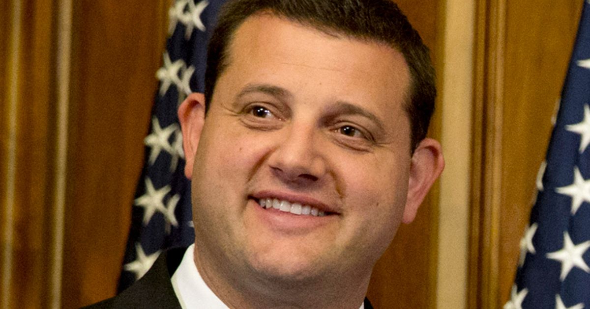 Republican Rep. David Valadao of California poses during a ceremonial re-enactment of his swearing-in ceremony in the Rayburn Room on Capitol Hill in Washington on Jan. 6, 2015.