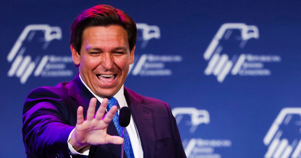 Florida Gov. Ron DeSantis waves to supporters at the Republican Jewish Coalition's leadership meeting in Las Vegas on Nov. 19.