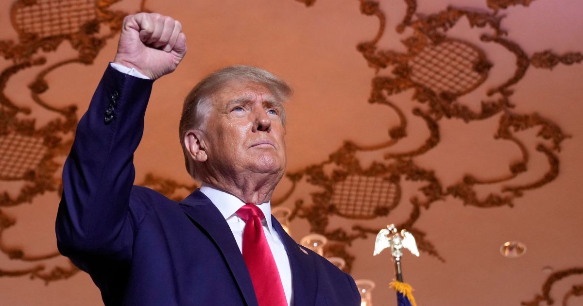 Former President Donald Trump stands on stage after announcing a third run for president as he speaks at Mar-a-Lago in Palm Beach, Florida, Tuesday.