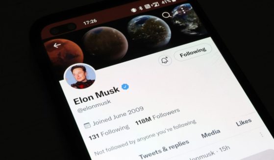 Twitter owner Elon Musk's profile on the social media platform is displayed on a smartphone on Nov. 21.