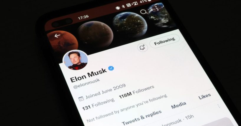 Twitter owner Elon Musk's profile on the social media platform is displayed on a smartphone on Nov. 21.