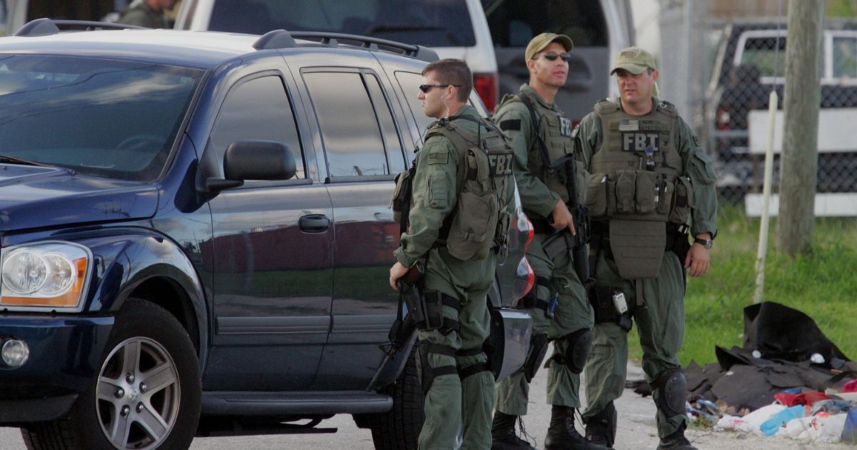FBI agents conduct what is being reported as a terrorism-related investigation on June 22, 2006 in Miami.