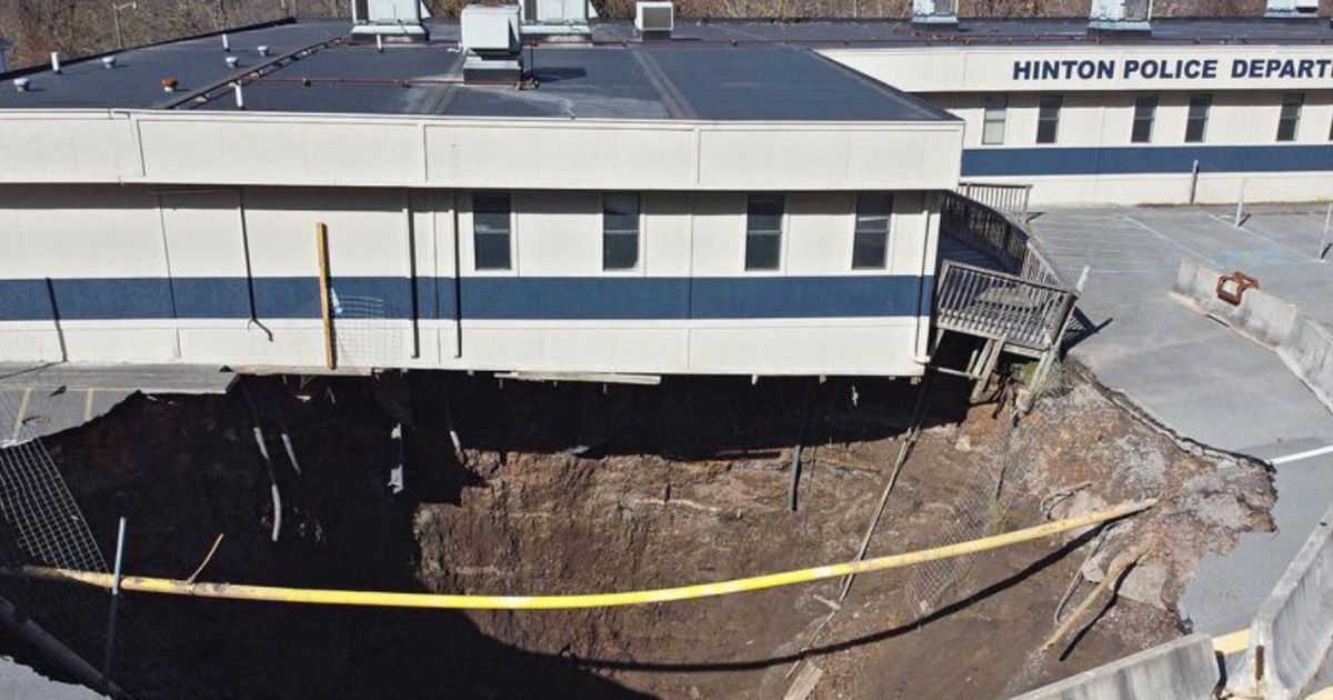 Watch as Police Station Teeters on the Edge of Collapse After Sinkhole