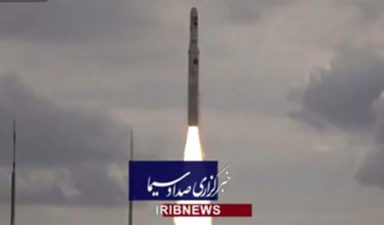 This image taken from video footage aired by Iranian state television on Saturday shows the launch of a satellite carrier rocket by Iran’s Revolutionary Guard from an undisclosed desert location.