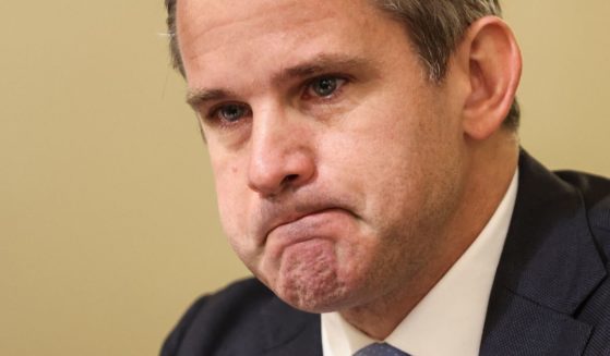 Republican Rep. Adam Kinzinger of Illinois gets emotional as he speaks during a hearing of the House select committee investigating Jan. 6, 2021, Capitol incursion at the Cannon House Office Building in Washington on July 27, 2021.