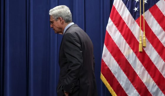 Attorney General Merrick Garland leaves after speaking at a news conference at the Department of Justice on Oct. 24 in Washington, D.C.