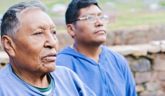 Two Native American men are seen in the above stock image.