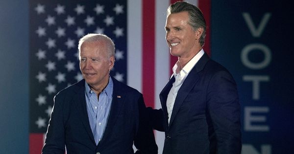 President Joe Biden, left, and California Democratic Gov. Gavin Newsom, right, stand together during a capaign event in Long Beach, California, on Sept. 13, 2021.