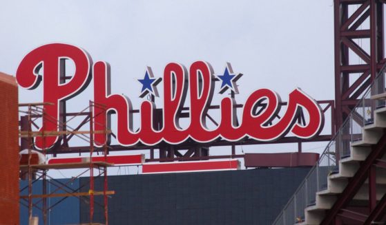 The Philadelphia Phillies logo sits on top of the scoreboard at Citizen's Bank Park, in Philadelphia, Pennsylvania, on Match 21, 2004.