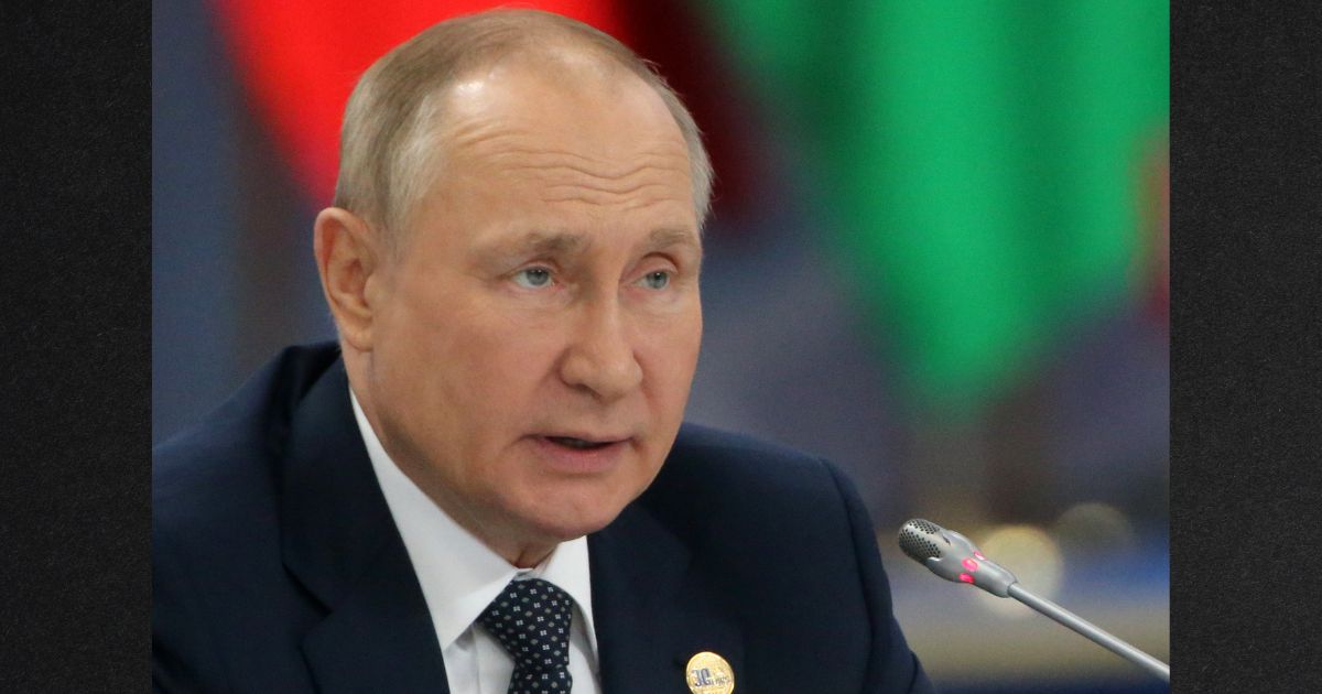 Russian President Vladimir Putin is seen in a file photo from October. A new report quotes an anonymous intelligence official as saying Putin is battling two serious illnesses.