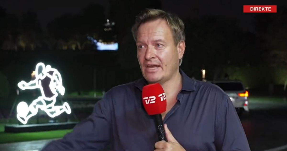Rasmus Tantholdt of Denmark's TV2 is interrupted by Qatari authorities during a Tuesday broadcast from the capital city of Doha.