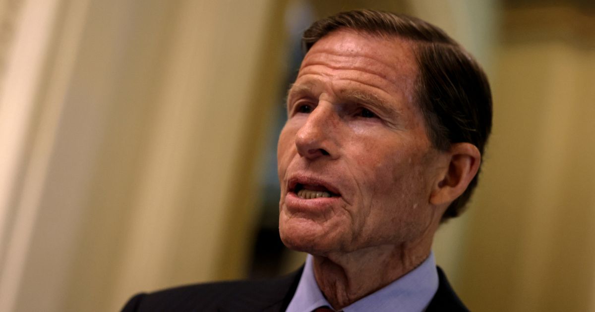 Democratic Sen. Richard Blumenthal of Connecticut speaks with a reporter before going to a luncheon with Senate Democrats in Washington, D.C., on June 14.