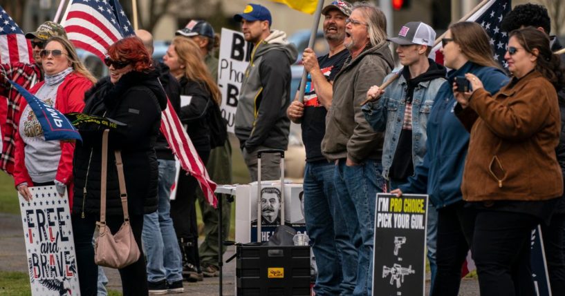 A group of demonstrators hold a Second Amendment rally at the Washington State Capitol in Olympia, Washington, March 20, 2021.