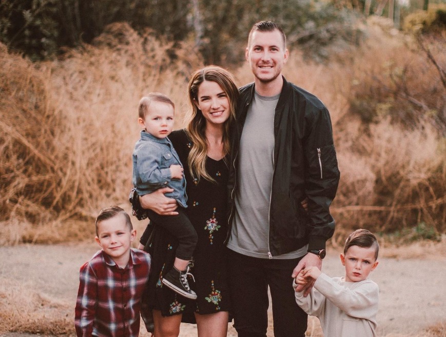 Pastor Andrew and Kayla Stoecklein take a family photo with their three children.