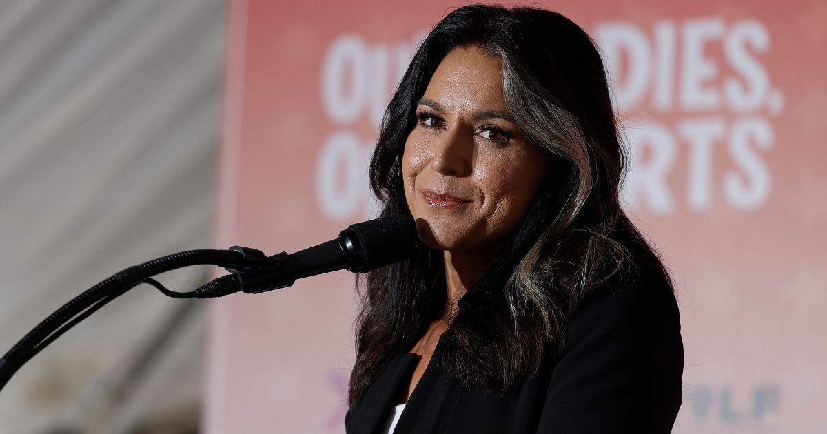 Former Democratic Rep. Tulsi Gabbard of Hawaii speaks at an "Our Bodies, Our Sports" rally in Washington, D.C., on June 23.