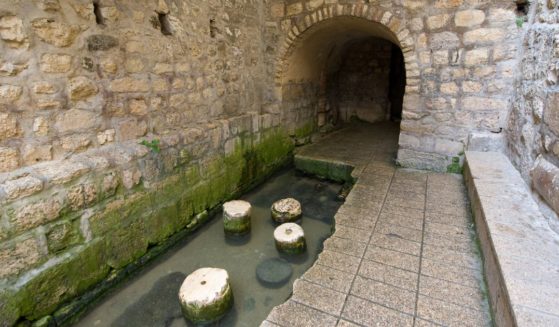 The Pool of Siloam lies at the end of Hezekiah's Tunnel on the southern slope of "the City David" in Jerusalem.