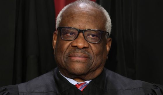 Supreme Court Justice Clarence Thomas, pictured while posing for the court's official portrait for 2022.