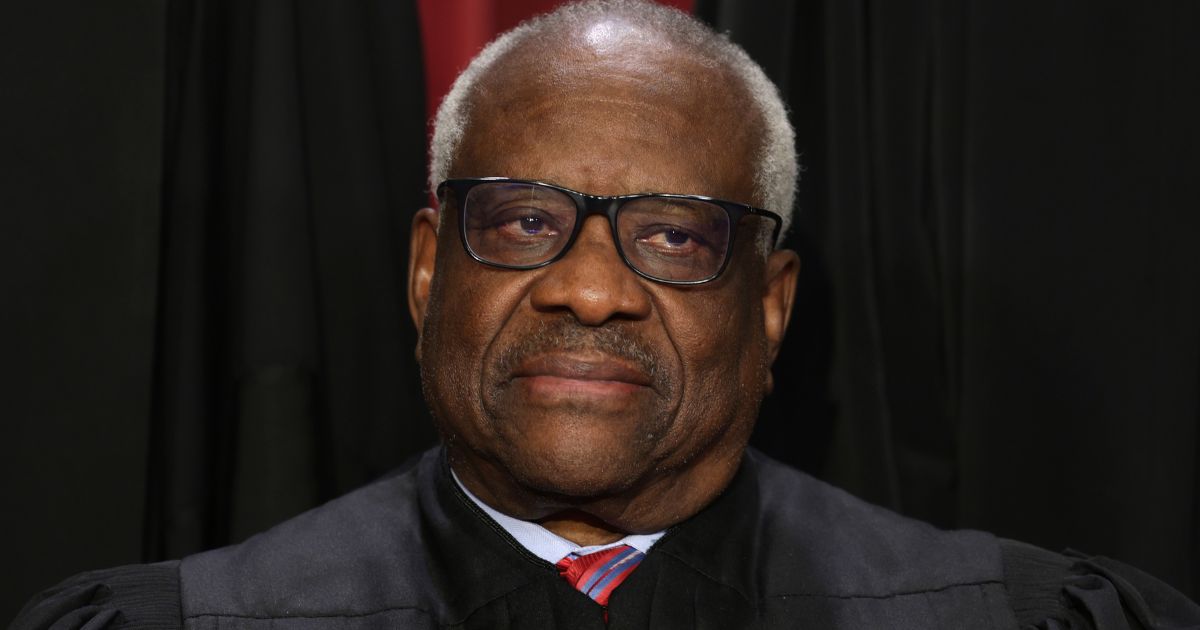 Supreme Court Justice Clarence Thomas, pictured while posing for the court's official portrait for 2022.