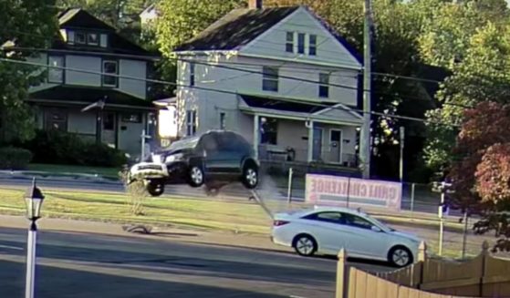 Security-camera video captured this "miracle" moment in Milford, Ohio, on Oct. 2. Both drivers survived the scary ordeal.
