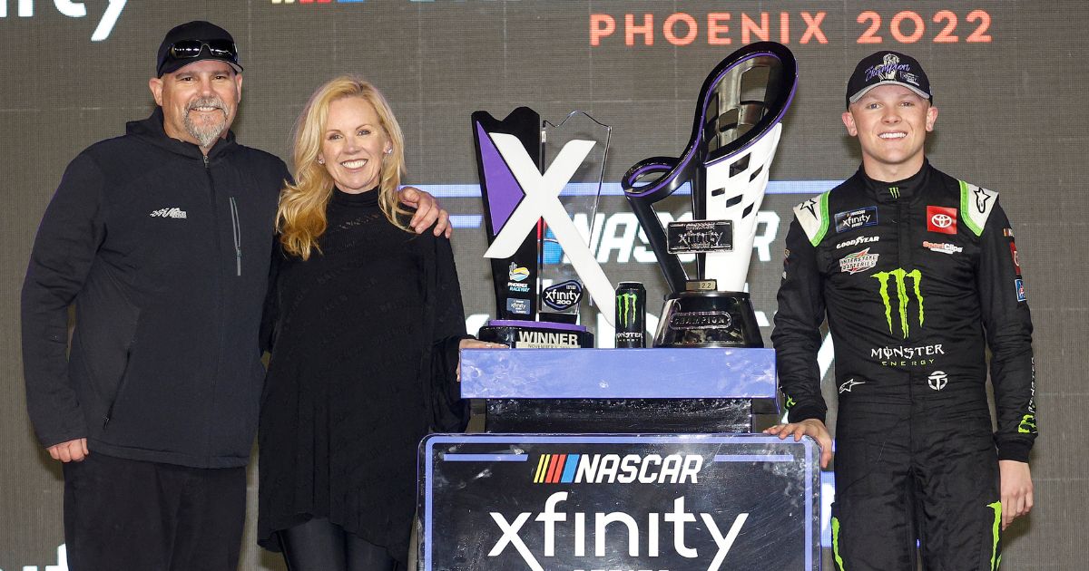 Coy Gibbs, left, Heather Gibbs and Ty Gibbs after Ty Gibbs won the Xfinity Series Championship on Saturday. Coy Gibbs died hours later.