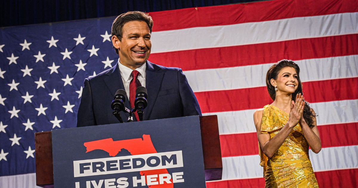 Florida Ron DeSantis with his wife, Casey DeSantis, speaks to supporters during an election night watch party at the Convention Center in Tampa, Florida, on Tuesday.
