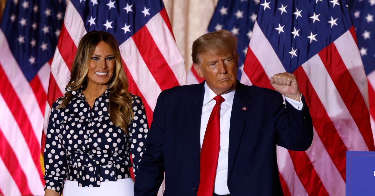 Former President Donald Trump, with former first lady Melania Trump, is pictured Tuesday at their home at the Mar-a-Lago Club in Palm Beach, Florida.