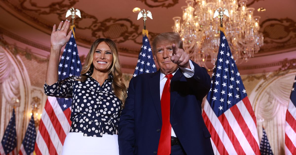 Former President Donald Trump and former first lady Melania Trump stand together at Trump's announcement Tuesday that he will seek the presidency in 2024.