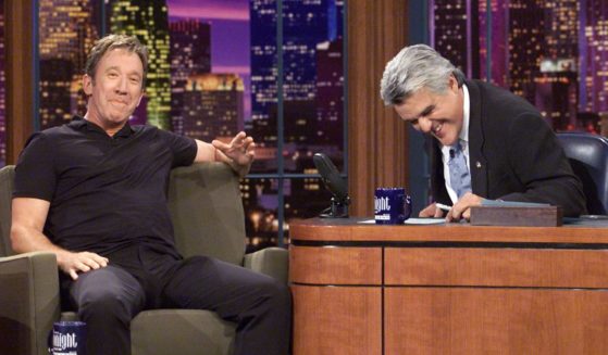 Tim Allen and his friend Jay Leno share a laugh on "The Tonight Show" at NBC Studios in Burbank, California, on Oct. 4, 2001.