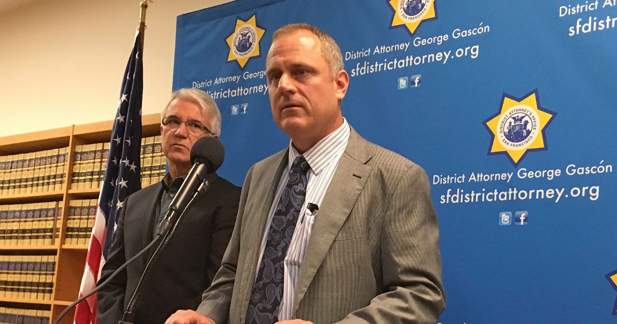 San Francisco elections director John Arntz, right, stands with San Francisco DA George Gascon, left, discussing election security during a news conference in San Francisco, California, on Nov. 1.