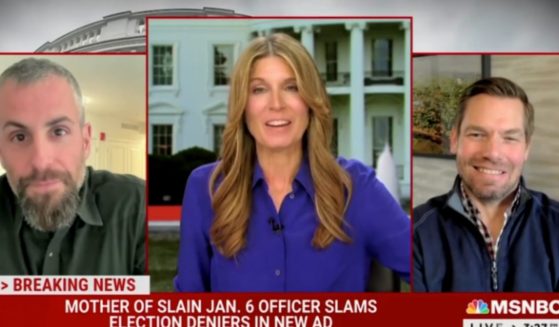 MSNBC host Nicolle Wallace laughs along with Democrat Rep. Eric Swallwell as a former D.C. Metropolitan officer Michael Fanone called Arizona Republican candidate Kari Lake a profane name on Tuesday.